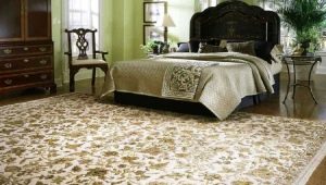Features of carpets in the bedroom and the secrets of their choice