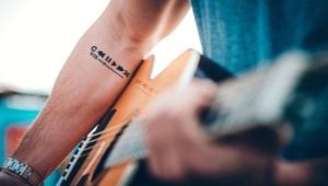 All about small men's arm tattoos