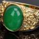Men's gold rings with emerald: design options and care secrets
