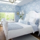 Blue wallpaper in the interior of the bedroom