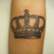Types of men's crown tattoos and their placement